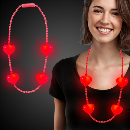 LED red heart necklace on a model 