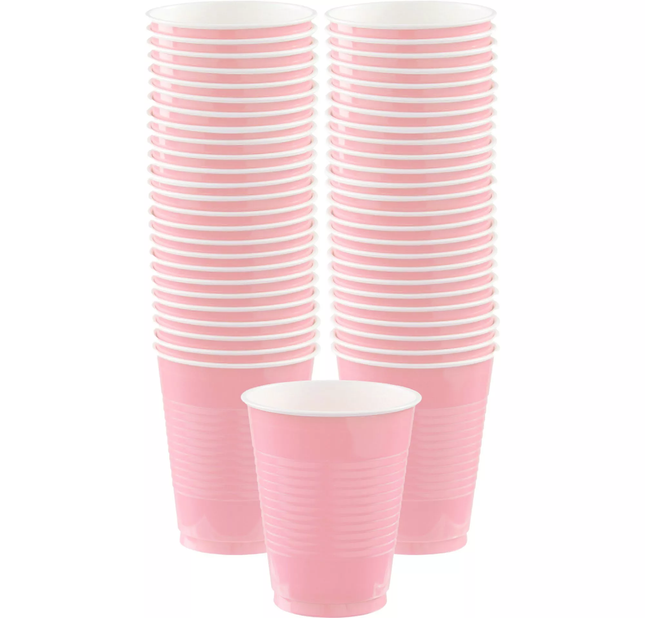 Pink striped paper cups on a white background