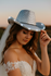 files/White_cowboy_hat_for_wedding_photoshoot.png